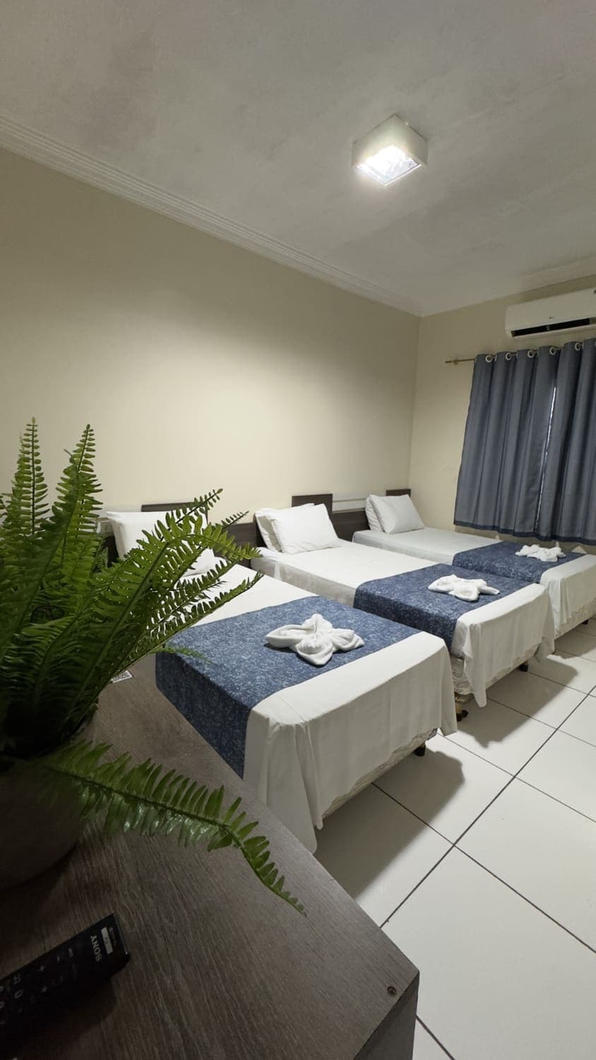 Apartamento Standard Triplo com três camas e ar-condicionado