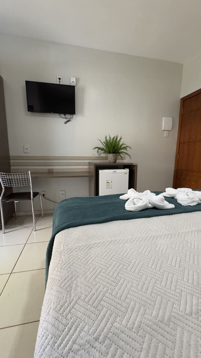 Acomodação do Palace Hotel com enxoval impecável
