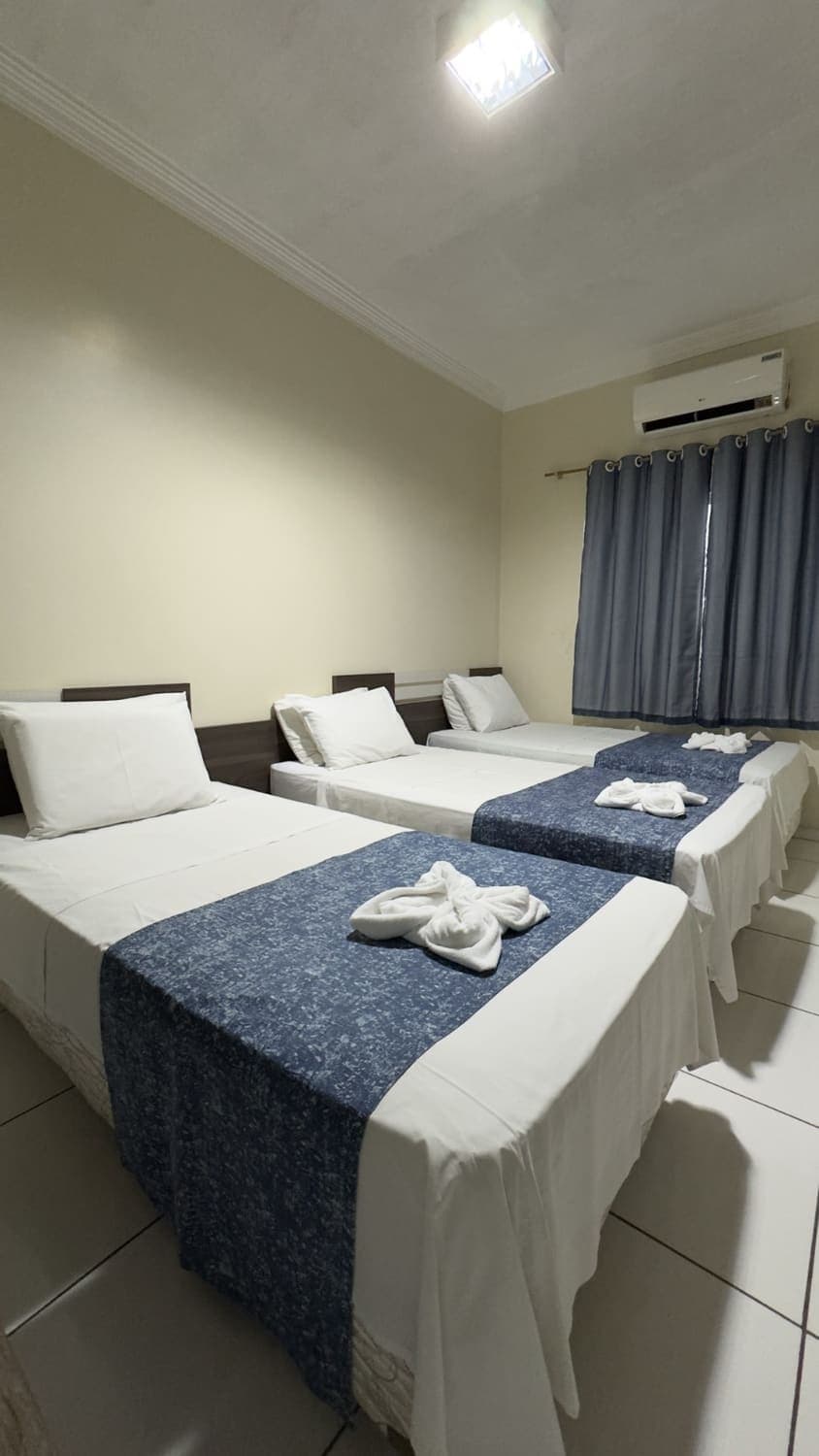 Apartamento Standard Triplo com três camas de solteiro
